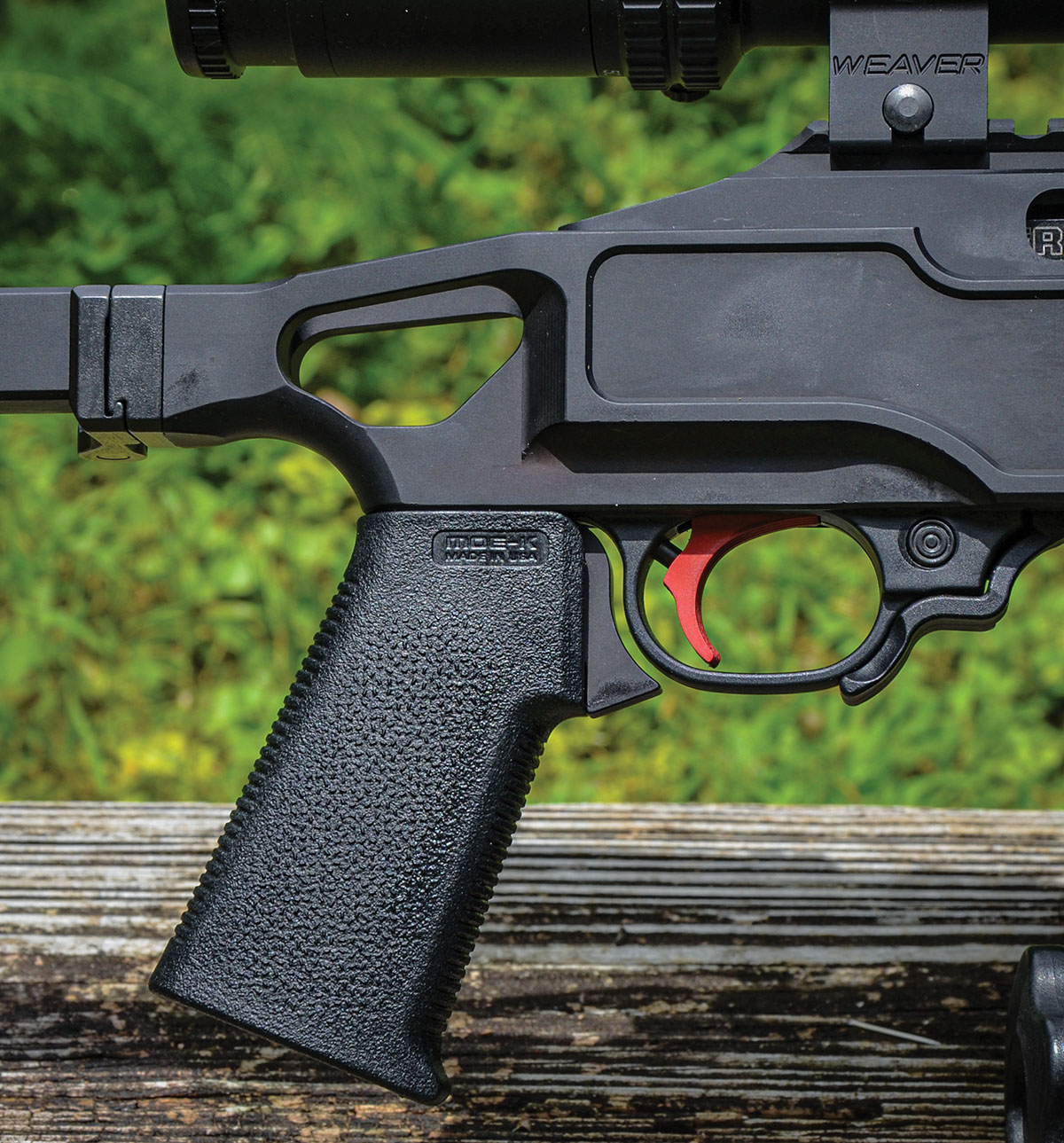 The chassis stock of the 10/22 Competition has a MAGPUL MOE-K grip and is compatible with other AR-15-style grips.